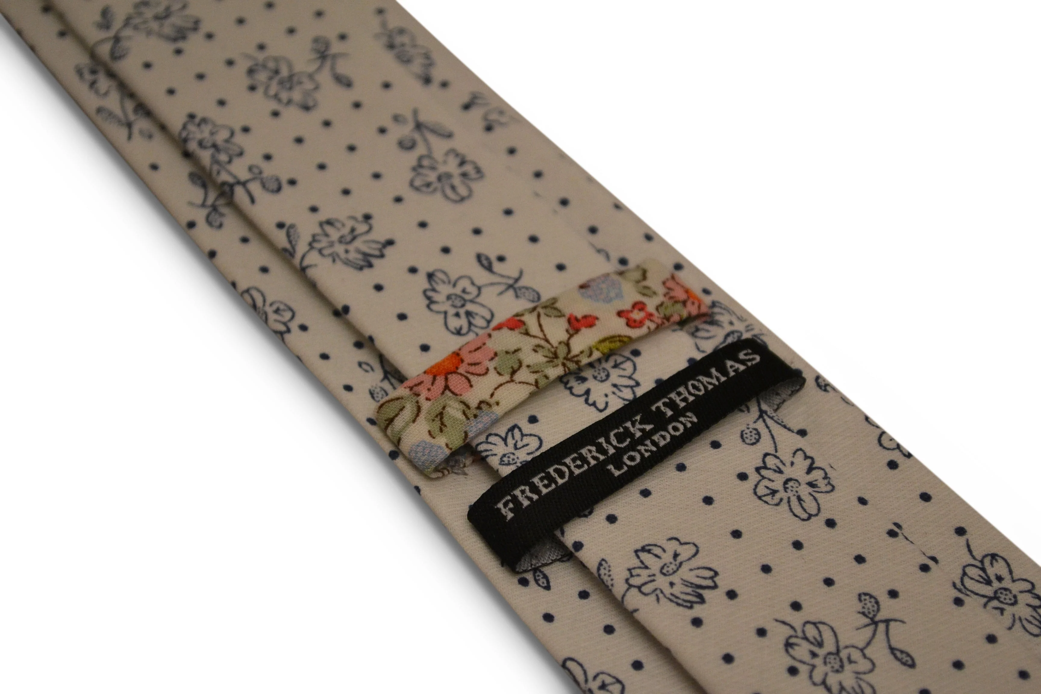 ivory white with navy blue floral design cotton tie - Image 2