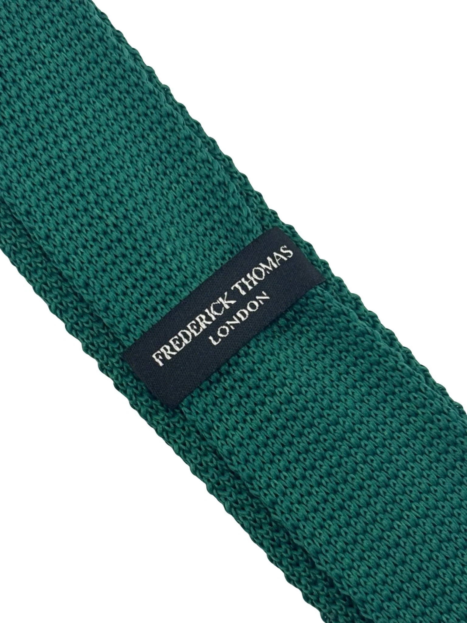 knitted tie in emerald green with an orange polka spots design - Image 4