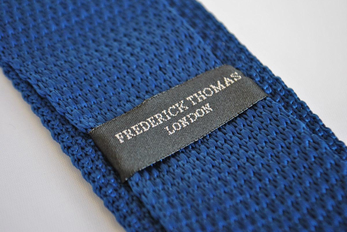 navy blue skinny knitted tie with white polka dots and pointed end - Image 2